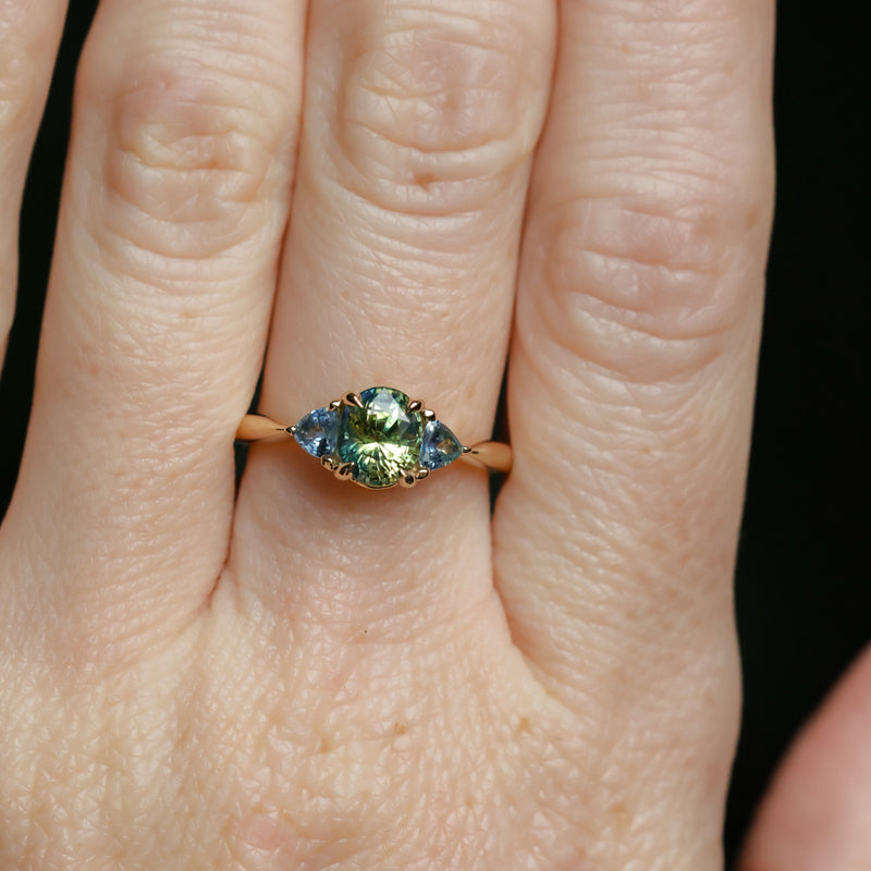 1.61ct Oval Madagascar Parti Sapphire and Trillion Sapphire Three Stone Low Profile Ring in 14k Yellow Gold