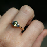 1.61ct Oval Madagascar Parti Sapphire and Trillion Sapphire Three Stone Low Profile Ring in 14k Yellow Gold