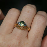 1.61ct Oval Madagascar Parti Sapphire and Trillion Sapphire Three Stone Low Profile Ring in 14k Yellow Gold