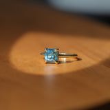 2.67ct Untreated Radiant Cut Montana Sapphire Four Prong Cathedral Solitaire in 18k Yellow Gold