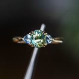 1.61ct Oval Madagascar Parti Sapphire and Trillion Sapphire Three Stone Low Profile Ring in 14k Yellow Gold