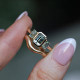 1.29ct Bezel Set Emerald Cut Untreated Montana Sapphire and Montana Sapphire Sides Three Stone Ring in 14k Yellow Gold
