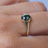 0.96ct Oval Teal Precision Cut Montana Sapphire Low Profile 4 Prong Signet Solitaire in 14k Yellow Gold