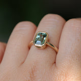 2.62ct Teal Green Emerald Cut Sapphire Low Profile Bezel Ring in 14k Yellow Gold
