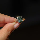 2.62ct Teal Green Emerald Cut Sapphire Low Profile Bezel Ring in 14k Yellow Gold