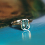 2.62ct Teal Green Emerald Cut Sapphire Low Profile Bezel Ring in 14k Yellow Gold