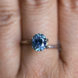 1.73CT PRECISION CUT OVAL MONTANA SAPPHIRE, DENIM PARTI TEAL WITH EARTHY INCLUSIONS, 7.47X6.16X4.69MM