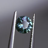 0.94CT ROUND MADAGASCAR SAPPHIRE, TEAL BLUE GREEN WITH GREY, 5.9X3.4MM