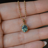 1.56ct Untreated Teal Green Nigerian Oval Sapphire 10 Prong Pendant in 14k Yellow Gold
