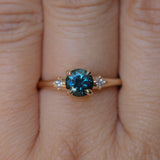 1.10ct Round Deep Teal Montana Sapphire and Princess Cut Diamond Rapids Low Profile Ring in 14k Yellow Gold