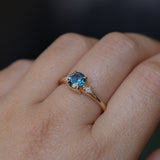 1.10ct Round Deep Teal Montana Sapphire and Princess Cut Diamond Rapids Low Profile Ring in 14k Yellow Gold