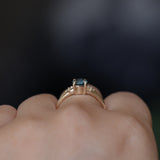 1.10ct Round Deep Teal Montana Sapphire and Princess Cut Diamond Rapids Low Profile Ring in 14k Yellow Gold