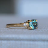 1.10ct Round Deep Teal Montana Sapphire and Princess Cut Diamond Rapids Low Profile Ring in 14k Yellow Gold