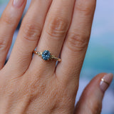 1.21ct Oval Blue Precision Cut Montana Sapphire Low Profile 4 Prong Leaf Bud Solitaire in 14k Yellow Gold