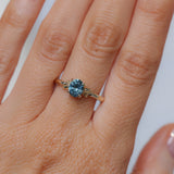 1.21ct Oval Blue Precision Cut Montana Sapphire Low Profile 4 Prong Leaf Bud Solitaire in 14k Yellow Gold