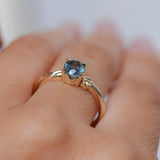 1.21ct Oval Blue Precision Cut Montana Sapphire Low Profile 4 Prong Leaf Bud Solitaire in 14k Yellow Gold
