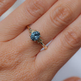 1.21ct Oval Blue Precision Cut Montana Sapphire Low Profile 4 Prong Leaf Bud Solitaire in 14k Yellow Gold