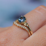 1.21ct Oval Blue Precision Cut Montana Sapphire Low Profile 4 Prong Leaf Bud Solitaire in 14k Yellow Gold