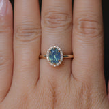 1.63ct Oval Untreated Madagascar Teal Sapphire Antique-Style Diamond Halo Ring in 14k Yellow Gold