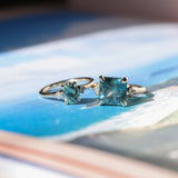 5.53ct Radant Cut Untreated Montana Sapphire and Princess Cut Diamond Rapids Low Profile Ring in 14k Yellow Gold