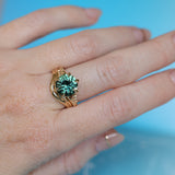 4.23ct Round Teal Green Sapphire Low Profile Wandering Vine Split Shank Six Prong Solitaire in 14k Yellow Gold