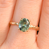 1.74ct Oval Untreated Blue Madagascar Sapphire Four Prong Evergreen Solitaire in 14k Yellow Gold