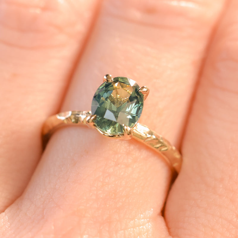 1.74ct Oval Untreated Blue Madagascar Sapphire Four Prong Evergreen Solitaire in 14k Yellow Gold