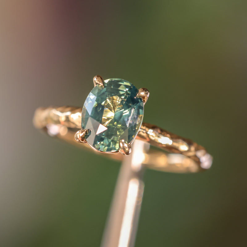 1.74ct Oval Untreated Blue Madagascar Sapphire Four Prong Evergreen Solitaire in 14k Yellow Gold