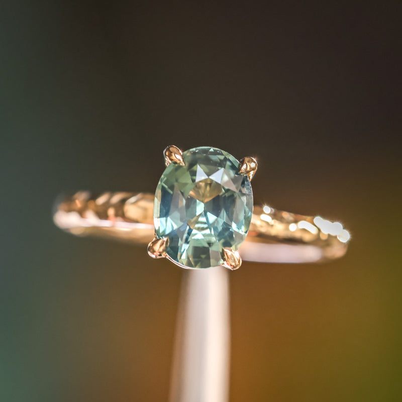 1.74ct Oval Untreated Blue Madagascar Sapphire Four Prong Evergreen Solitaire in 14k Yellow Gold