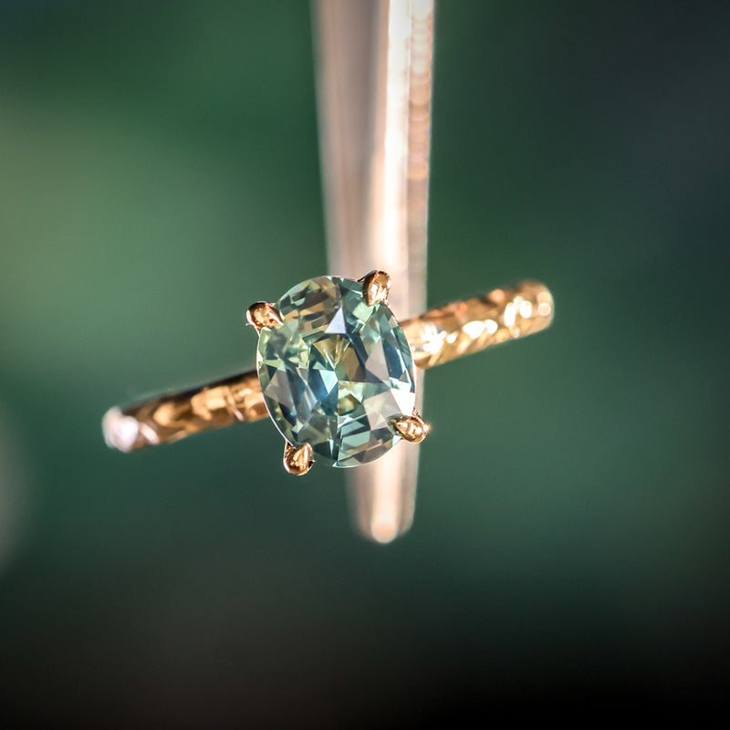 1.74ct Oval Untreated Blue Madagascar Sapphire Four Prong Evergreen Solitaire in 14k Yellow Gold