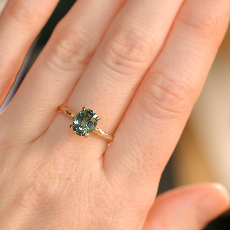 1.74ct Oval Untreated Blue Madagascar Sapphire Four Prong Evergreen Solitaire in 14k Yellow Gold