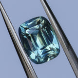 2.04CT ELONGATED CUSHION MADAGASCAR SAPPHIRE, PARTI LIGHT TEAL, UNTREATED, 7.6X5.6X4.7MM