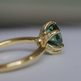 2.07ct Precision Cut Untreated Teal Oval Montana Sapphire Diamond-studded Sea Star Solitaire in 18k Yellow Gold