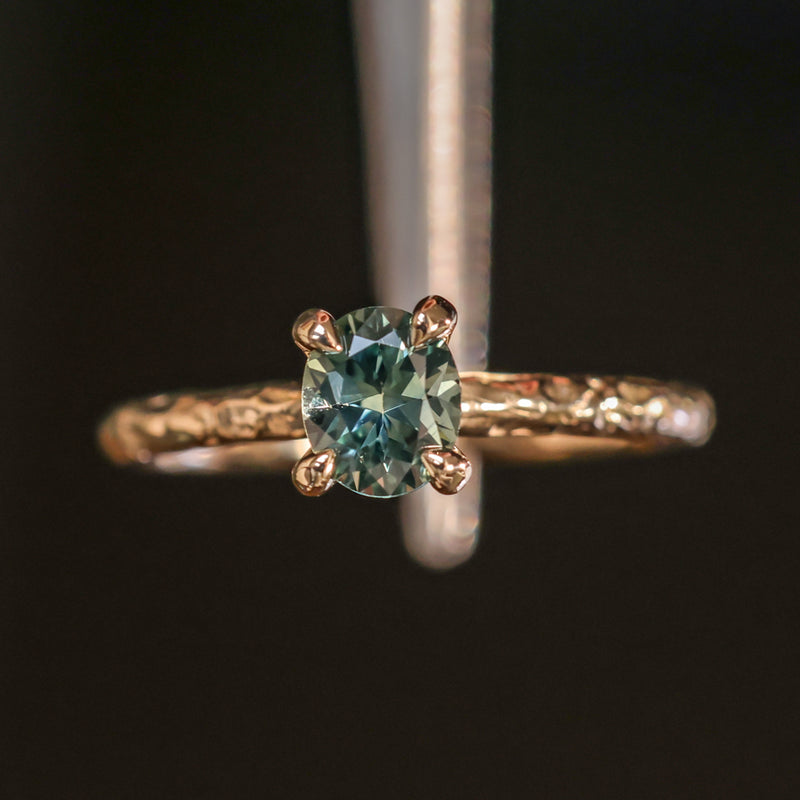 0.85ct Oval Precision Cut Ocean Blue Montana Sapphire Evergreen Carved 4 Prong Solitaire in 14k Yellow Gold