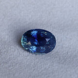 4.04CT OVAL MADAGASCAR SAPPHIRE, MEDIUM TEAL BLUE PARTI, UNTREATED, 10.6X7.8X6.1MM