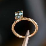 1.58ct Oval Untreated Light Blue Montana Sapphire Evergreen Carved 4 Prong Solitaire in 14k Yellow Gold