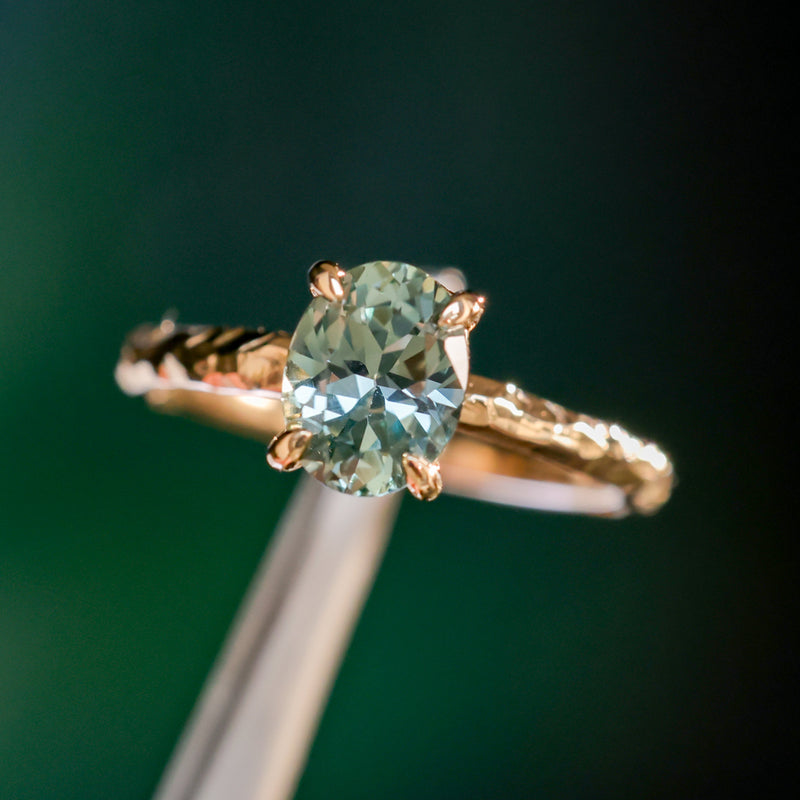 1.58ct Oval Untreated Light Blue Montana Sapphire Evergreen Carved 4 Prong Solitaire in 14k Yellow Gold