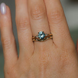 1.77ct Oval Precision Cut Parti Light Teal Montana Sapphire and Princess Cut Diamond Rapids Low Profile Ring in 14k Yellow Gold