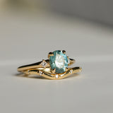 1.77ct Oval Precision Cut Parti Light Teal Montana Sapphire and Princess Cut Diamond Rapids Low Profile Ring in 14k Yellow Gold