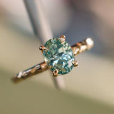 1.58ct Oval Untreated Light Blue Montana Sapphire Evergreen Carved 4 Prong Solitaire in 14k Yellow Gold