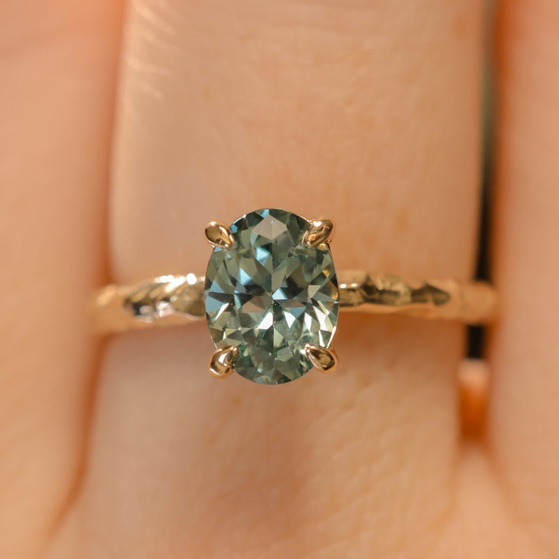 1.58ct Oval Untreated Light Blue Montana Sapphire Evergreen Carved 4 Prong Solitaire in 14k Yellow Gold