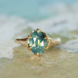 3.29ct Untreated Oval Parti Green Sapphire Low Profile 6 Prong Evergreen Carved Solitaire in 14k Yellow Gold