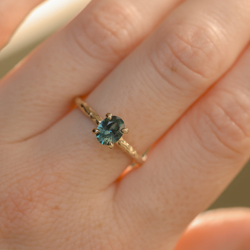 0.80ct Oval Precision Cut Blue Montana Sapphire Evergreen Carved 4 Prong Solitaire in 14k Yellow Gold