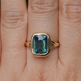 4.09ct Elongated Cushion Cut Teal Sapphire Low Profile Split Shank Bezel Ring in 14k Yellow Gold- Appraised Stone