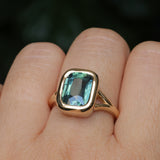 4.09ct Elongated Cushion Cut Teal Sapphire Low Profile Split Shank Bezel Ring in 14k Yellow Gold- Appraised Stone