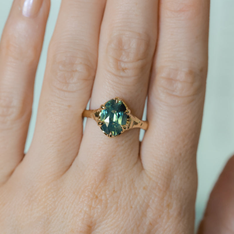 3.29ct Untreated Oval Parti Green Sapphire Low Profile 6 Prong Evergreen Carved Solitaire in 14k Yellow Gold