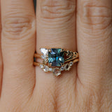 1.65ct Teal Blue Radiant Cut Madagascar Sapphire in Wandering Vine Low Profile 4 Prong Setting with Diamonds in 14k Yellow