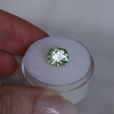 2.57CT FANCY PRECISION CUSHION MONTANA SAPPHIRE, PARTI OLIVE GREEN AND GOLD, 8.82X7.54X5.37MM - APPRAISED STONE