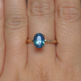 1.92ct Silky Teal Oval Nigerian Sapphire Evergreen Carved Solitaire in 14k Yellow Gold