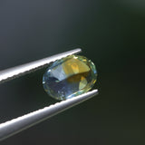 1.52CT OVAL NIGERIAN SAPPHIRE, PARTI YELLOW BLUE GREEN, 7.77X6.07MM, UNTREATED